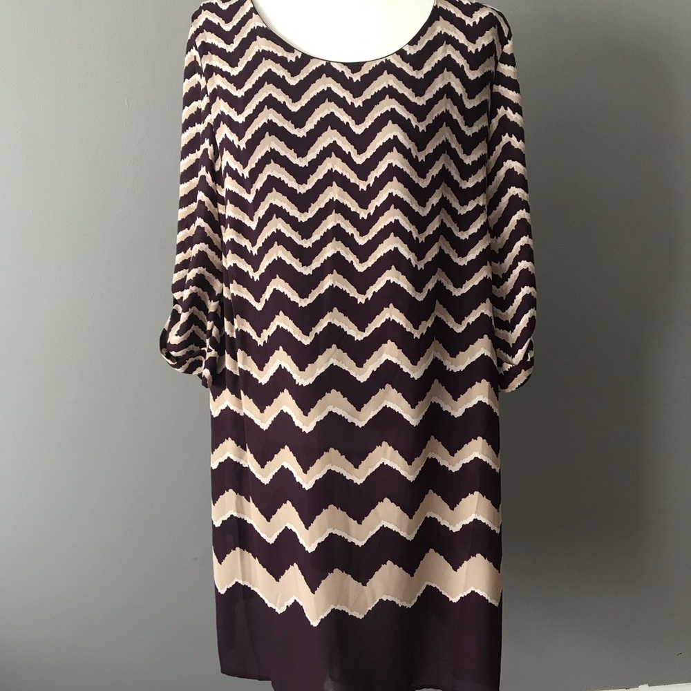 Purple, tan and cream dress.